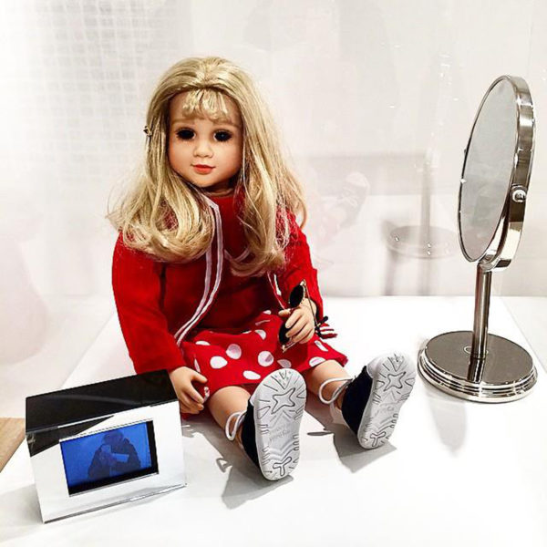 CybeRoberta Roxanne-hershman Lynn Hershman Leeson, CybeRoberta. Custom-made doll, clothing, glasses, webcam, surveillance camera, mirror, original programming and telerobotic head rotating system. 1996.